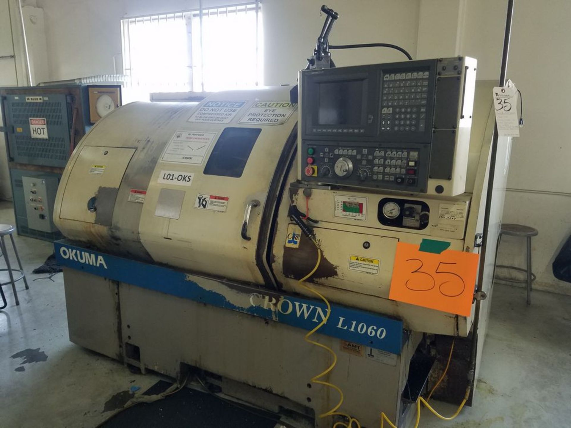 (2000) Okuma Crown L1060 CNC Turning Center w/ Okuma OSP-U10L CNC Controls, 12-Position Turret,