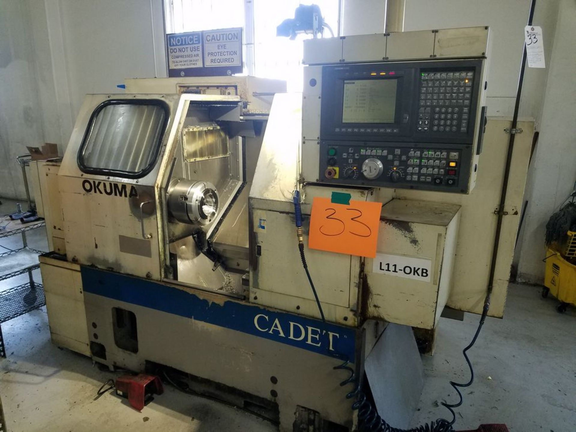 (1996) Okuma Cadet CNC Turning Center w/ Okuma OSP700m CNC Controls, 12-Position Turret,