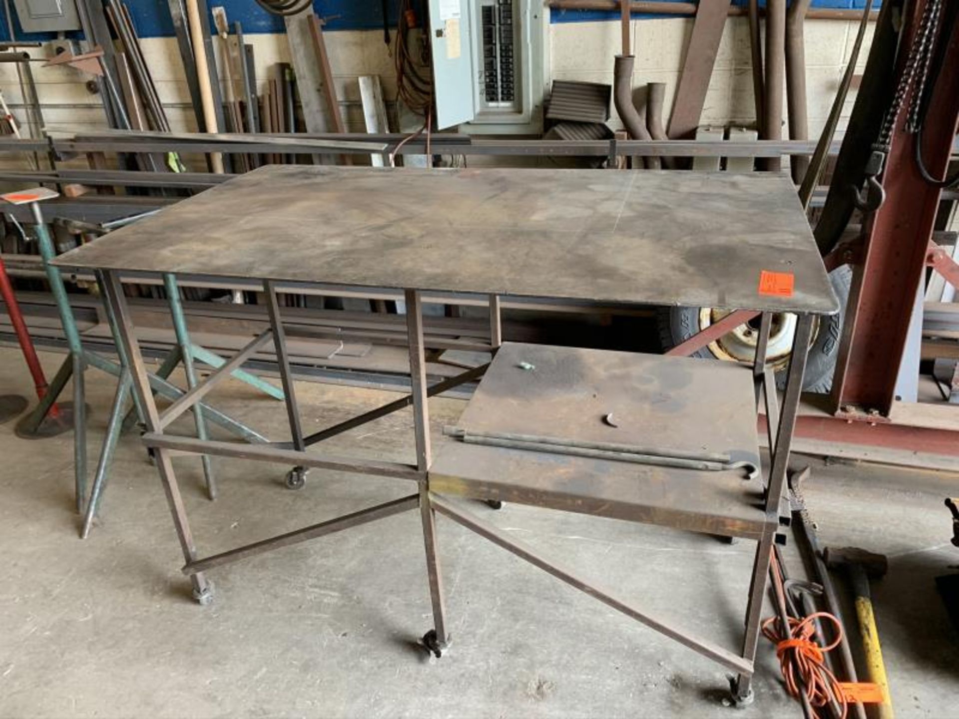 Rolling Steel Table: 5'long x 3'wide x 9"tall