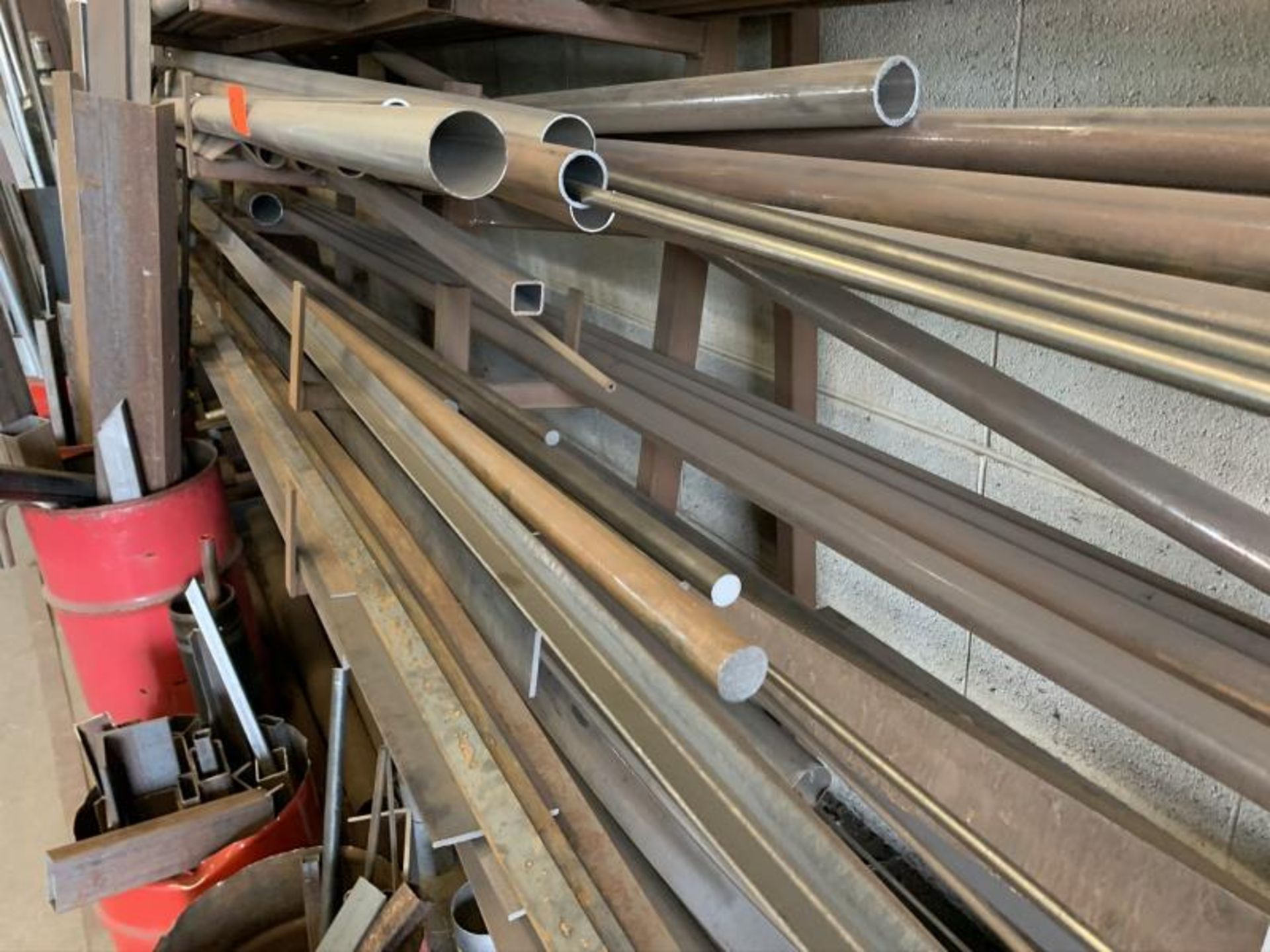 Eight tier cantalever metal stock rack, contents of steel & Alumium inventory with (5) red piles - Image 2 of 6