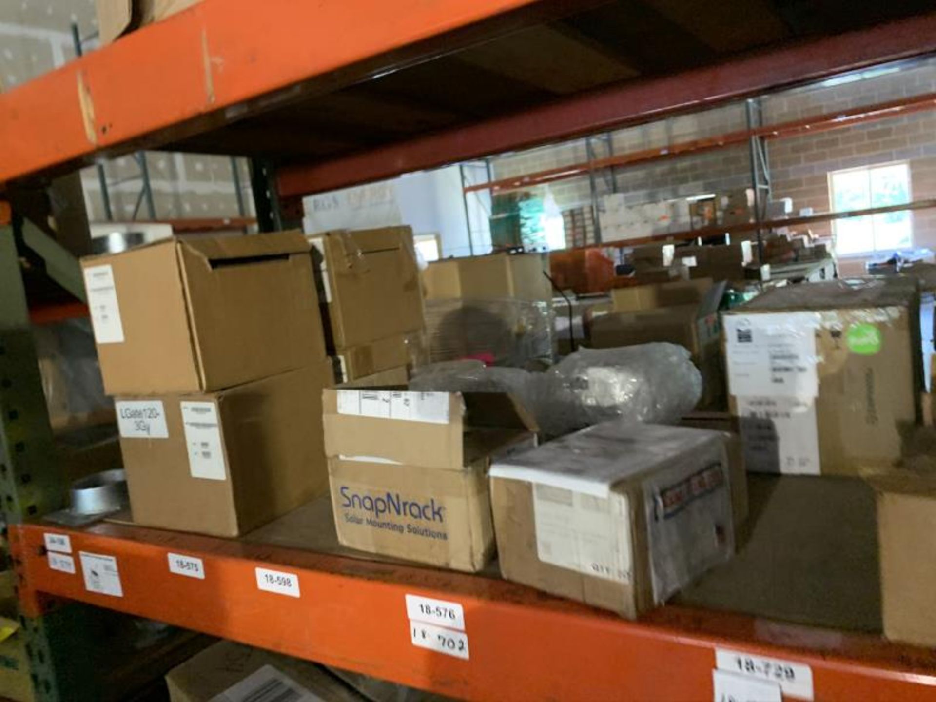 Contents of 3 Shelves/Pallets Racks with equilibtium solar universal clamp kits with micro - Image 6 of 6