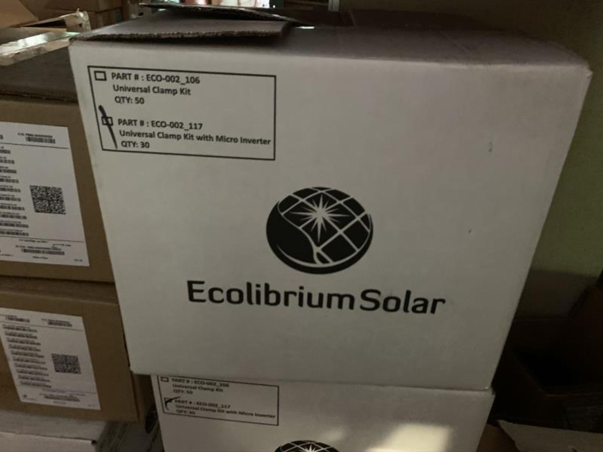 Contents of 3 Shelves/Pallets Racks with equilibtium solar universal clamp kits with micro - Image 2 of 6