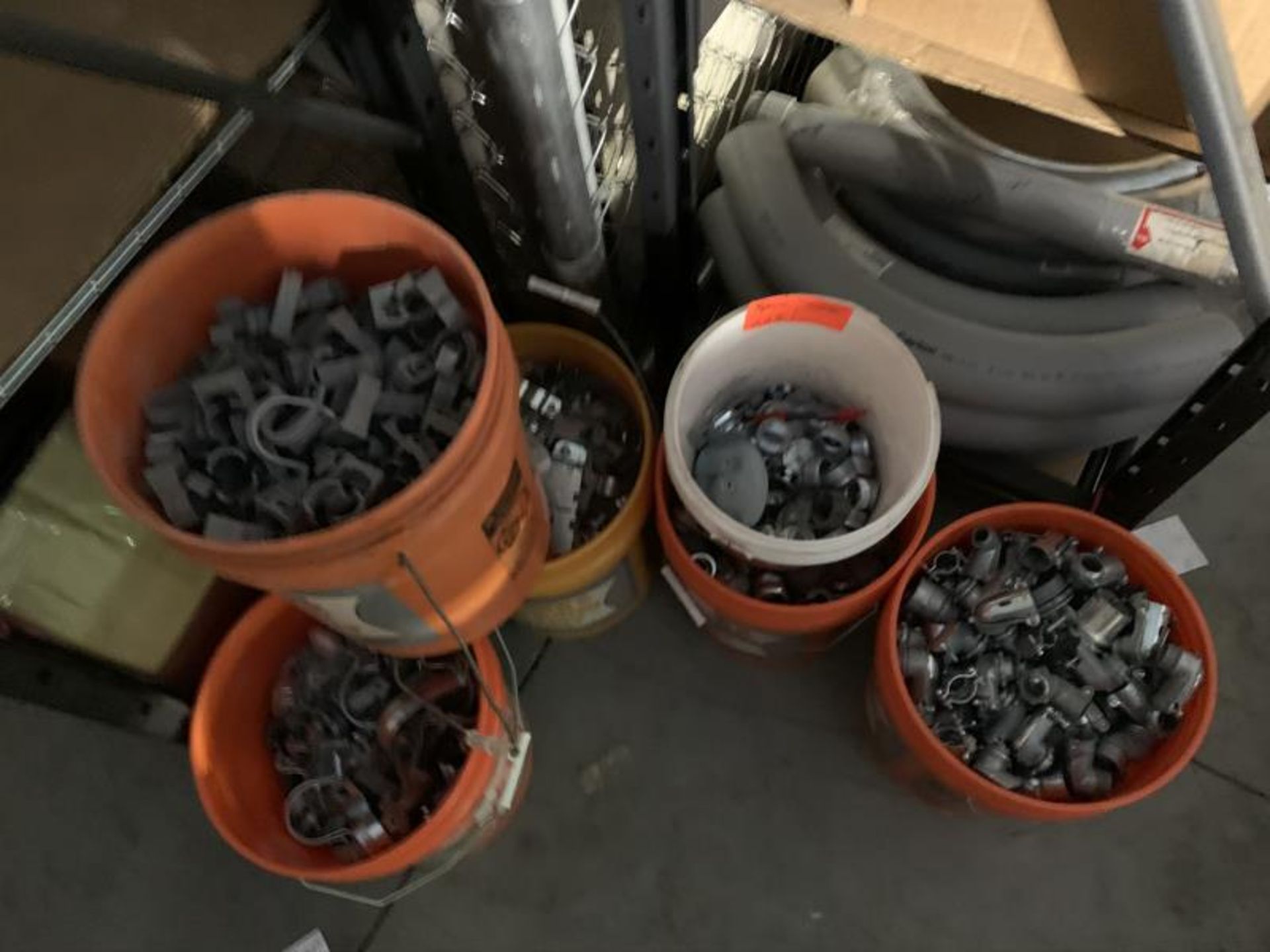 (6) Buckets of hangers & coupling