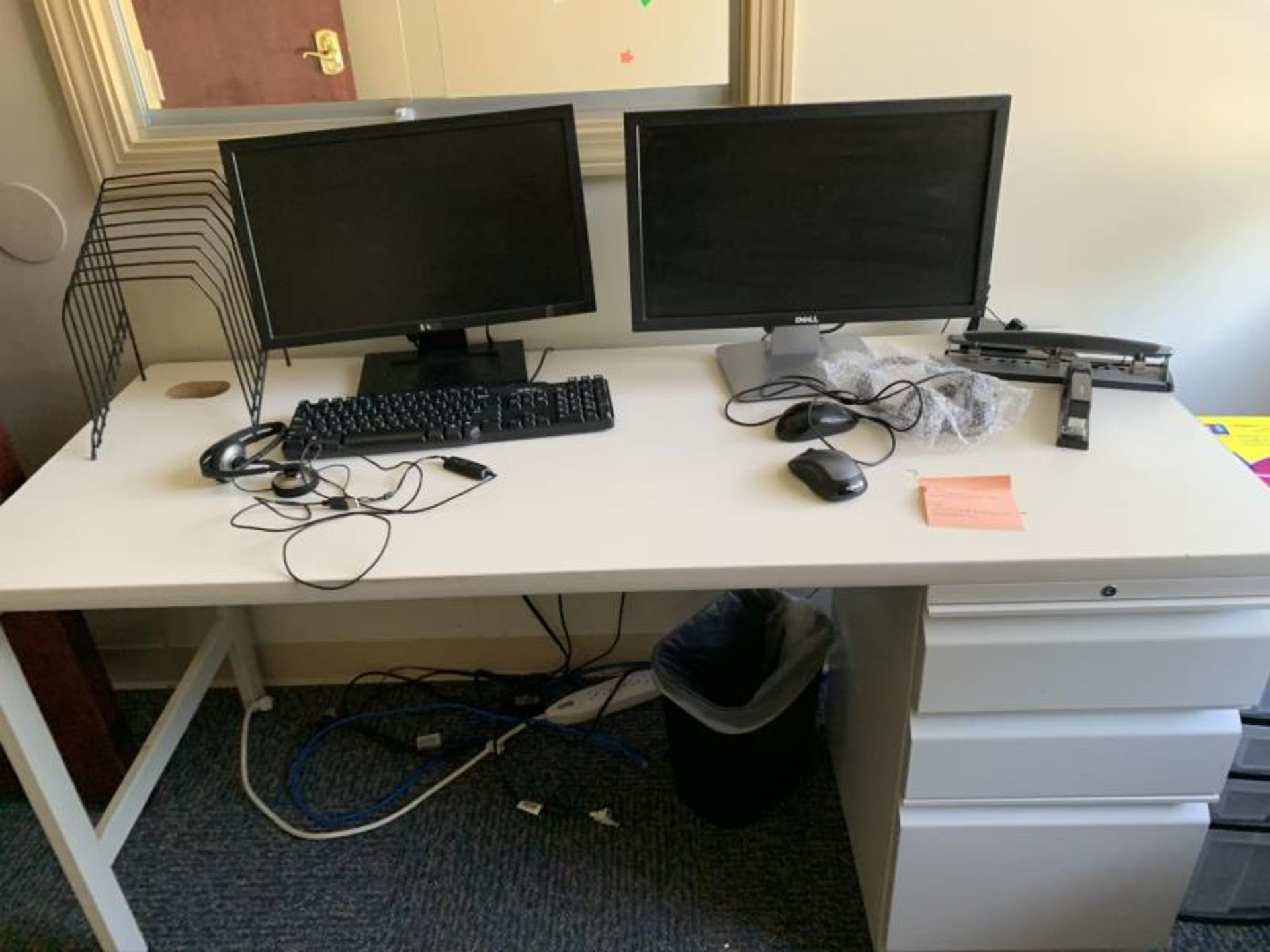 Laminte desk with (2) Dell flat panel monitors