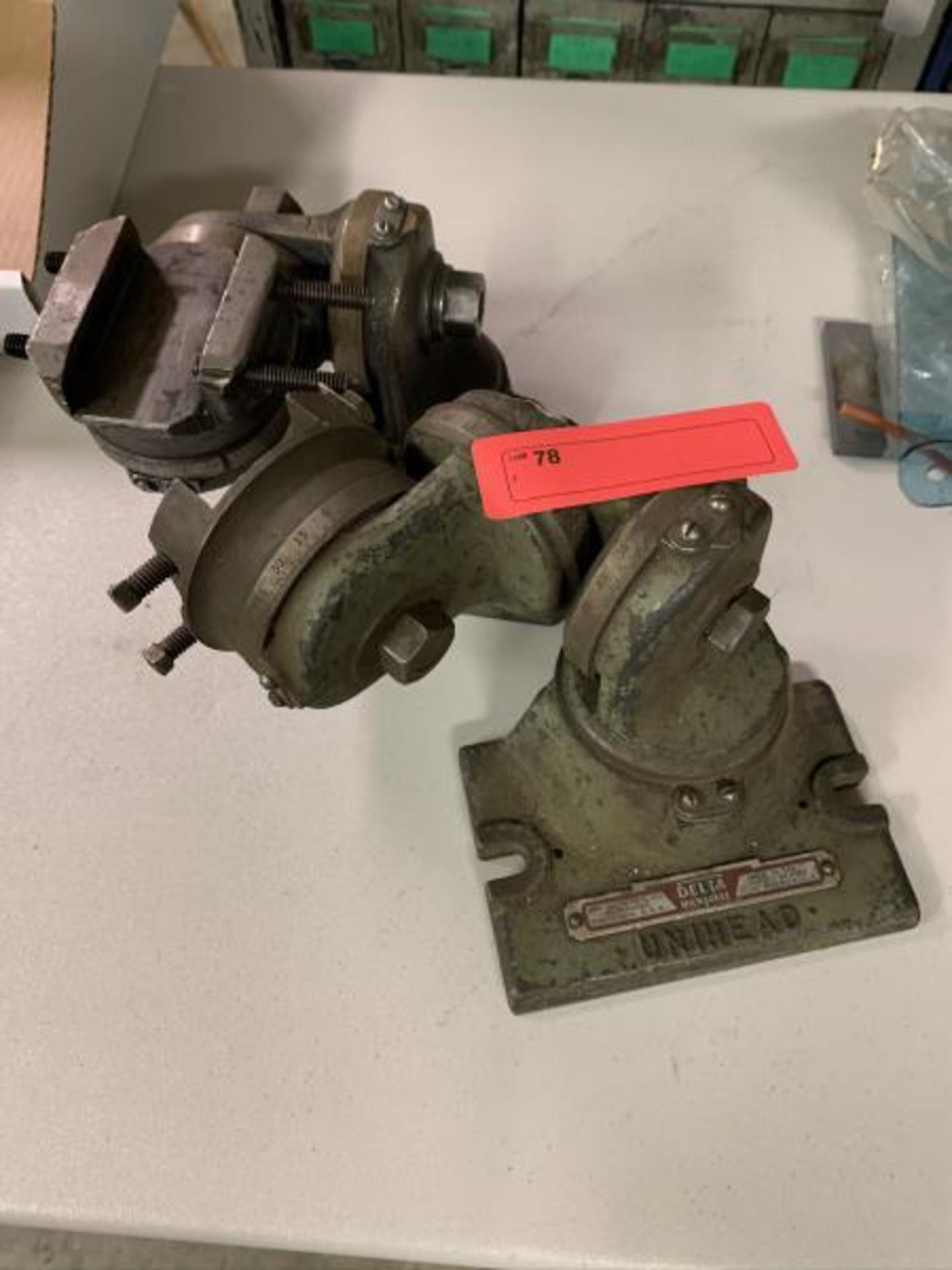 (2) Grinding fixtures, (1) Delta Milwaukee Unihead, (1) Univise