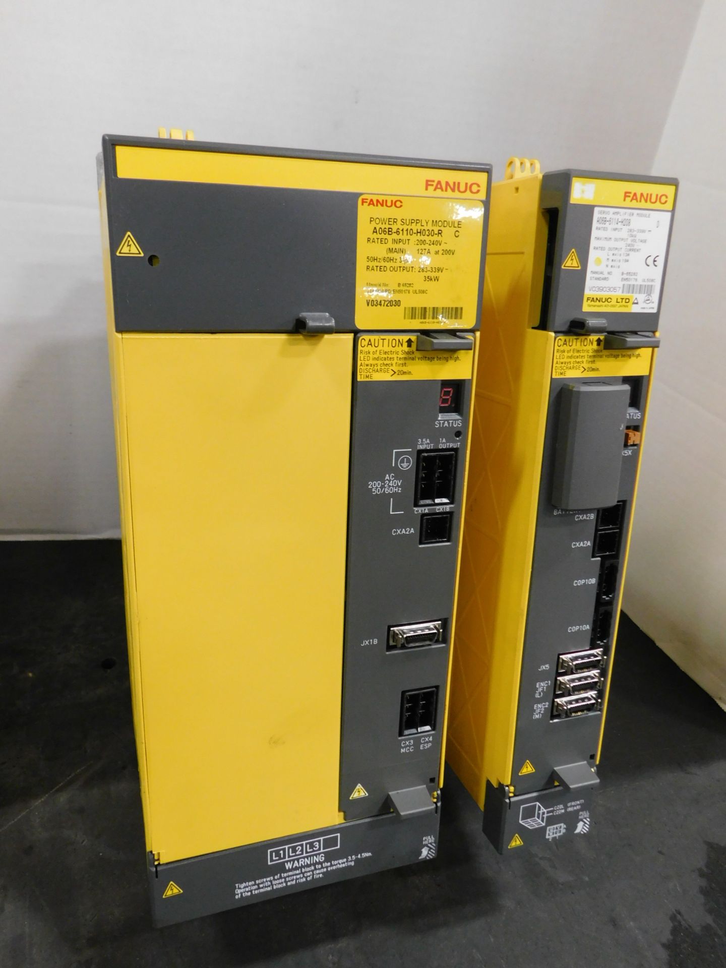 (1) Fanuc Model A06B-6110-R Power Supply Module and (1) Fanuc Model A06B-6114-H208 Servo Amplifier