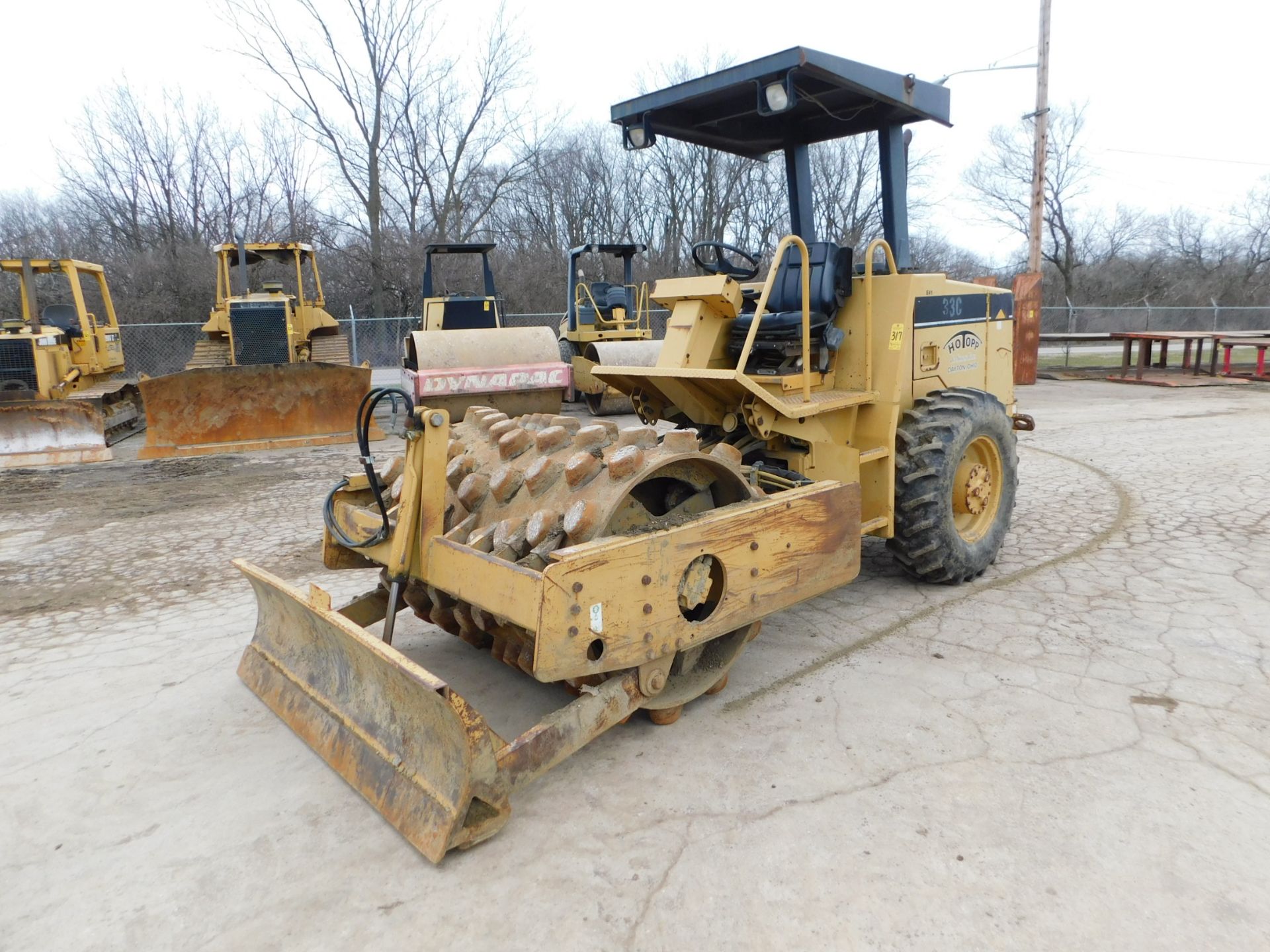 1996 Caterpillar Model CP433C Padfoot Compactor, Canopy, 5'6" Drum Width, 6'6" Blade, 2,575 hours,