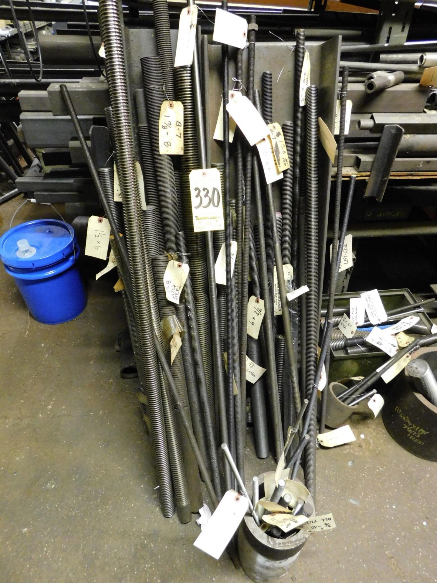 All-Thread Rod Along Side of Steel Storage Rack