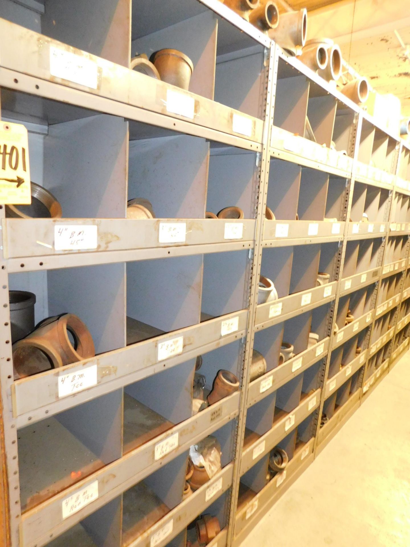 Contents of (4) Sections of Metal Shelving