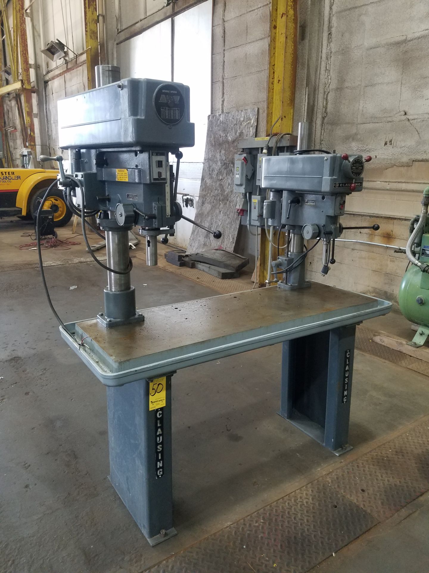 Clausing Twin Spindle Drill Press Mounted on 4-Spindle Production Table