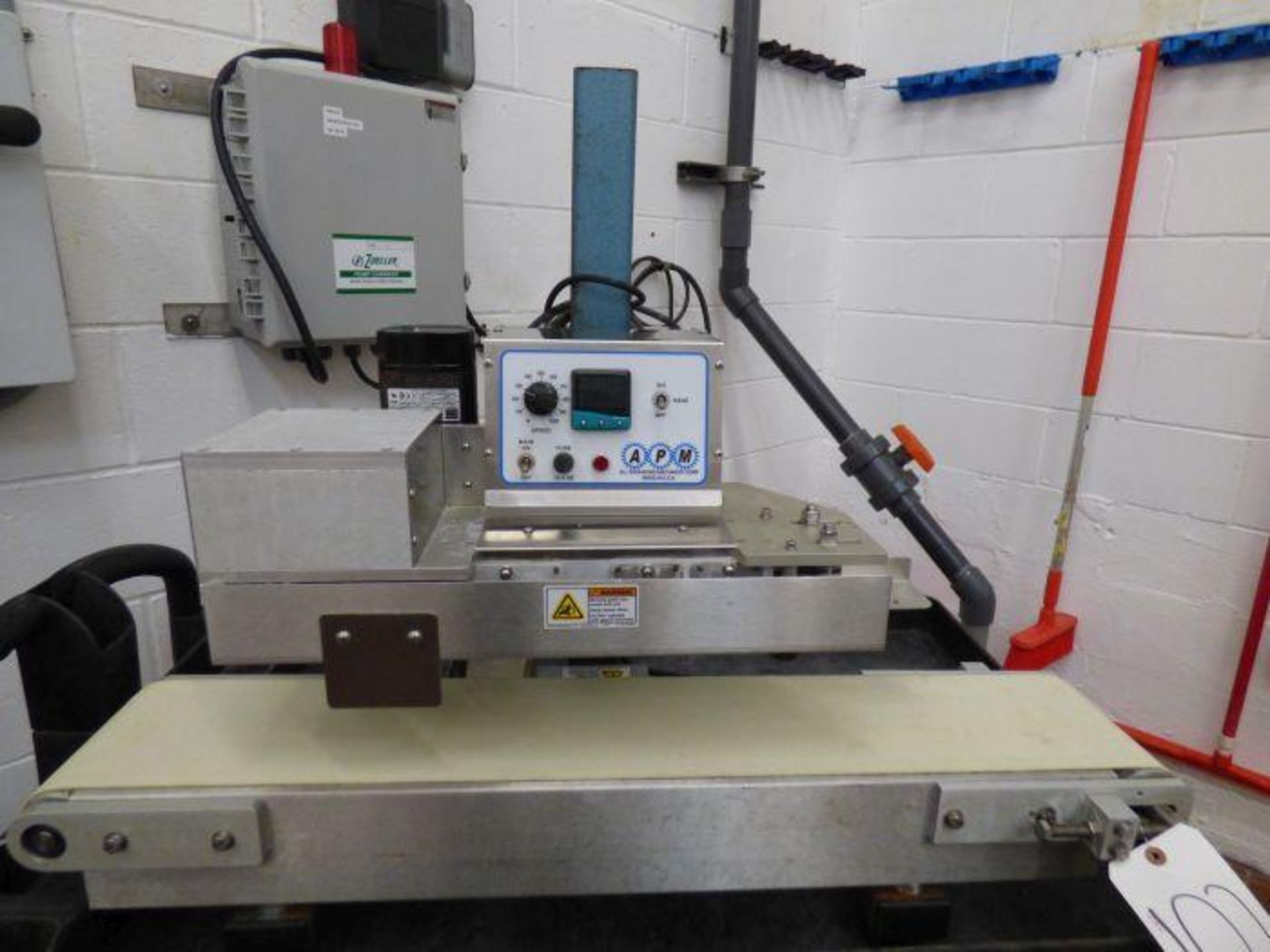 APM Conveyorized Band Sealer