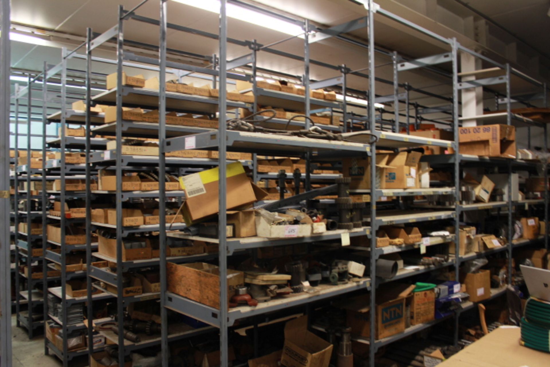 ROW OF 6 SECTIONS OF PARTS SHELVING, EACH 4'L X 2'D X 10'H