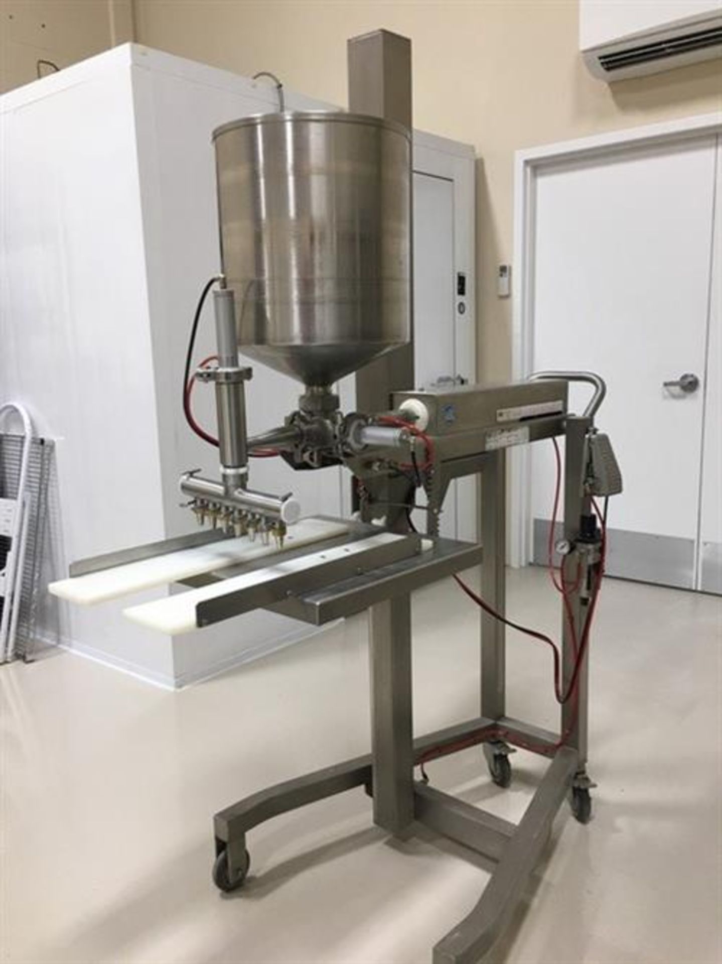 Unifiller model UNI-V-694 Piston Filler - Stainless Steel Hopper - 7 Nozzle manifold - Portable on