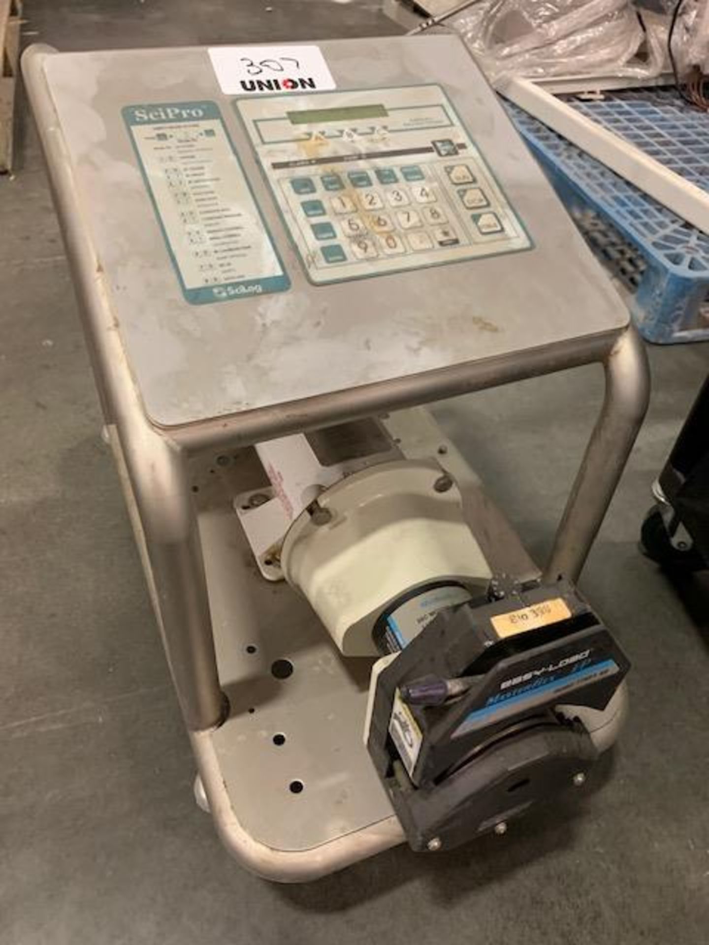 Masterflex Easy Load I/P Peristaltic Pump with SciPro controller on Stainless steel portable cart.