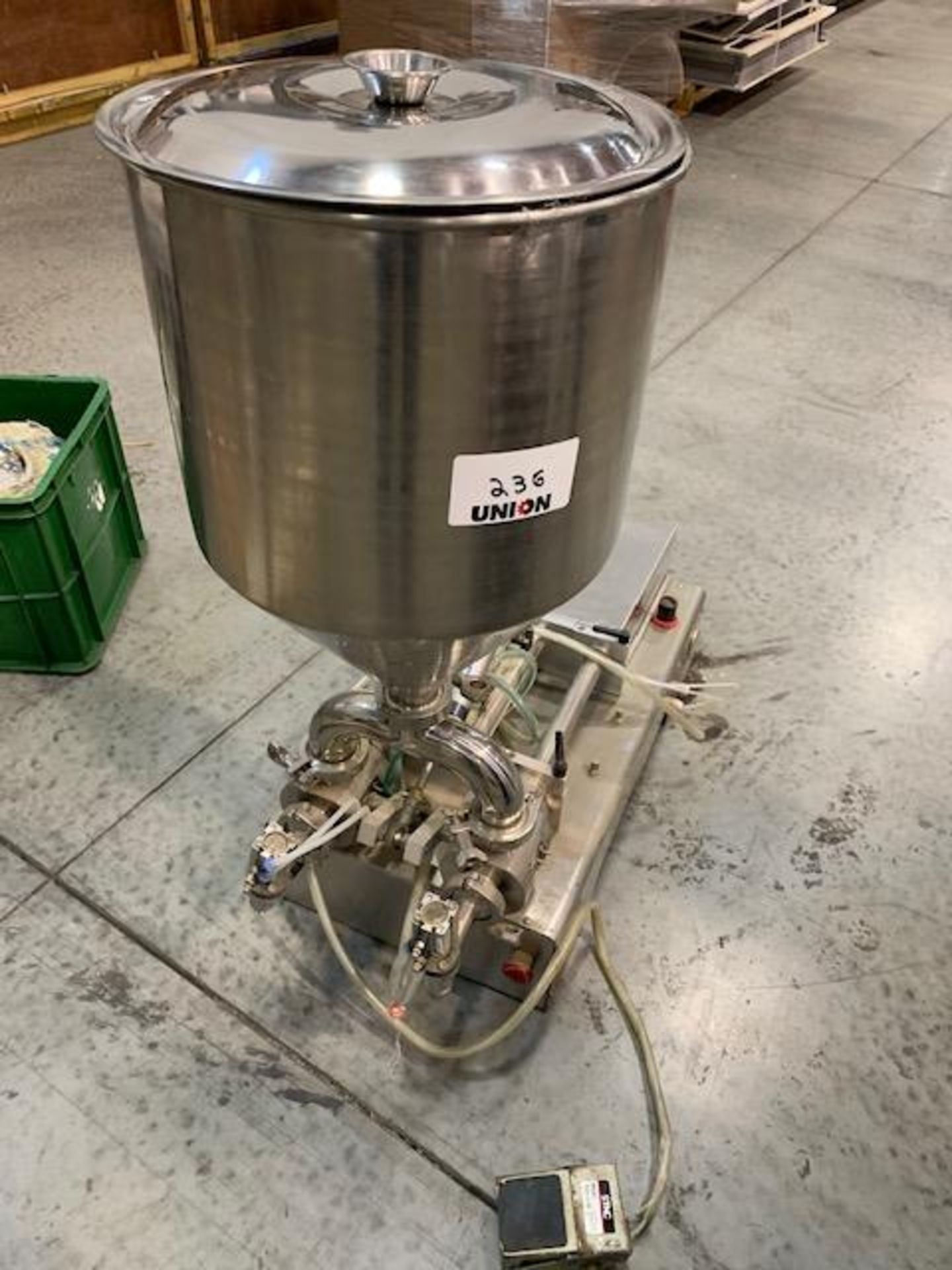 Twin Piston Filler model RGSGP60J with stainless steel hopper 13" diameter x 19" deep, 60 ml pistons