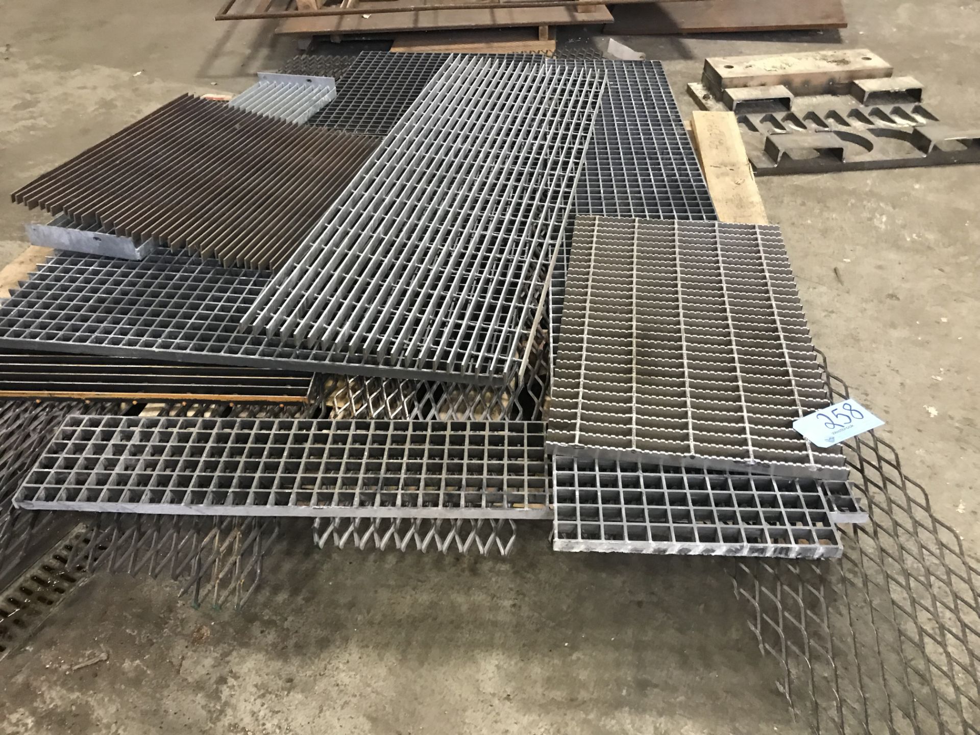 Lot-Expanded Metal Grates and Steel Plate Stock in (9) Stacks on the the Floor and in (1) Rack - Image 2 of 9