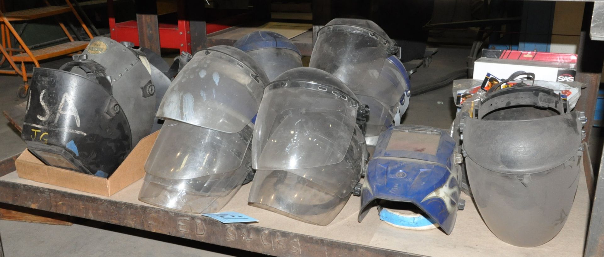 Lot-Face Shields and Welding Helmets Under (1) Table