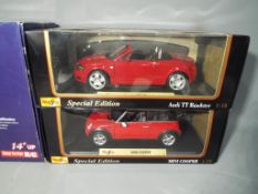 A quantity of diecast vehicles to include Maisto Special Edition Audi TT Roadster and Maisto