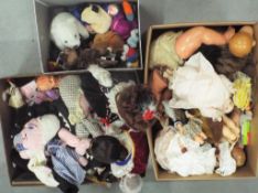 Three boxes of dolls and Ty Beanies in various scales and from various eras.