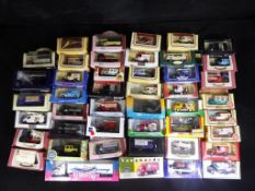 Lledo, Vanguards and Others - In excess of 40 boxed diecast model vehicles in various scales.