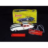 Clifford - A boxed Clifford Jaguar E-Type Battery Operated Remote Control Plastic Car.
