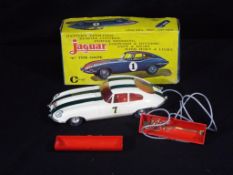 Clifford - A boxed Clifford Jaguar E-Type Battery Operated Remote Control Plastic Car.