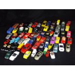 Hongwell, Corgi, Matchbox and Others. Over 60 unboxed diecast model vehicles in various scales.