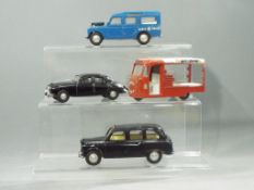 Spot-On - 4 unboxed diecast model vehicles.