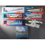 Seven plastic model kits of aeroplanes to include Sky Marks and Wooster and one 1:400 scale diecast