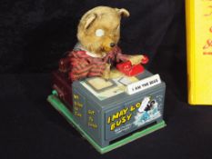 An unboxed vintage tinplate battery operated Teddy Bear toy 'I am the Boss',