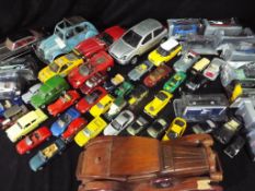 Diecast models - a quantity of boxed and unboxed playworn vehicles by Welly, Burrago,
