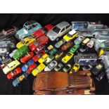 Diecast models - a quantity of boxed and unboxed playworn vehicles by Welly, Burrago,