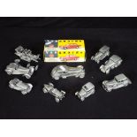 A good collection of nine pewter model motor vehicles including 1930 Bentley Barnato,