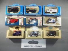 Lledo - In excess of 70 boxed diecast model vehicles in by LLedo including some Code 3 examples.