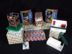 Scalextric - Eight boxed vintage Scalextric Accessories.