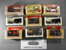 Lledo - In excess of 60 boxed Horse Drawn diecast model vehicles in by LLedo.