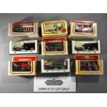 Lledo - In excess of 60 boxed Horse Drawn diecast model vehicles in by LLedo.