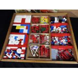 LEGO - an early LEGO system in wooden box with sliding lid and original color playcard,