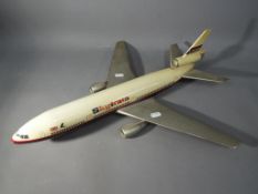 A plastic composition travel agents model McDonnell Douglas DC-10 in Laker Airways 'Skytrain'