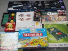 Board Games - a quantity of board games to include Monopoly, Scrabble, Cluedo and similar,