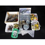 Meccano - a large quantity of unboxed Meccano accessories and parts including axle rods, wheels,