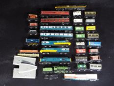Hornby - Four unboxed Hornby OO Gauge locomotives with over 20 items of freight and passenger