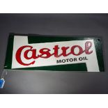 A cast iron advertising sign marked Castrol This lot must be paid for and removed no later than