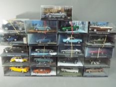 Twenty one model vehicles from the G E Fabbri James Bond Car Collection all contained in original