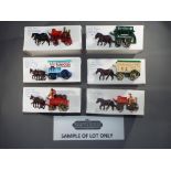 Lledo - Approximately 48 horse drawn diecast model vehicles by LLedo all in collector boxes.