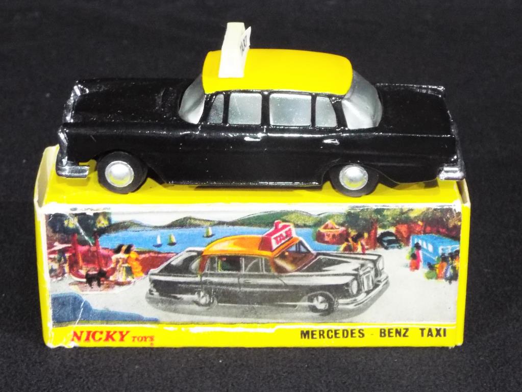 Nicky Toys - A boxed Nicky Toys 051 Mercedes Benz Taxi; black body, yellow roof,