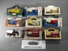 Lledo - In excess of 70 boxed Horse Drawn diecast model vehicles in by LLedo.