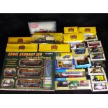 Corgi, Atlas Editions, LLedo and Others - Over 20 boxed diecast model vehicles in various scales.