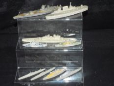 Chad Valley and Similar Manufacturers - An armada of 9 Waterline Warships in approx 1/1200th scale.