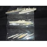 Chad Valley and Similar Manufacturers - An armada of 9 Waterline Warships in approx 1/1200th scale.